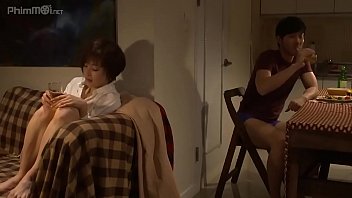 couple having sex on table